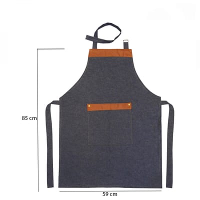 DELANTAL JEAN LISO CON ECOCUERO Y TACHAS